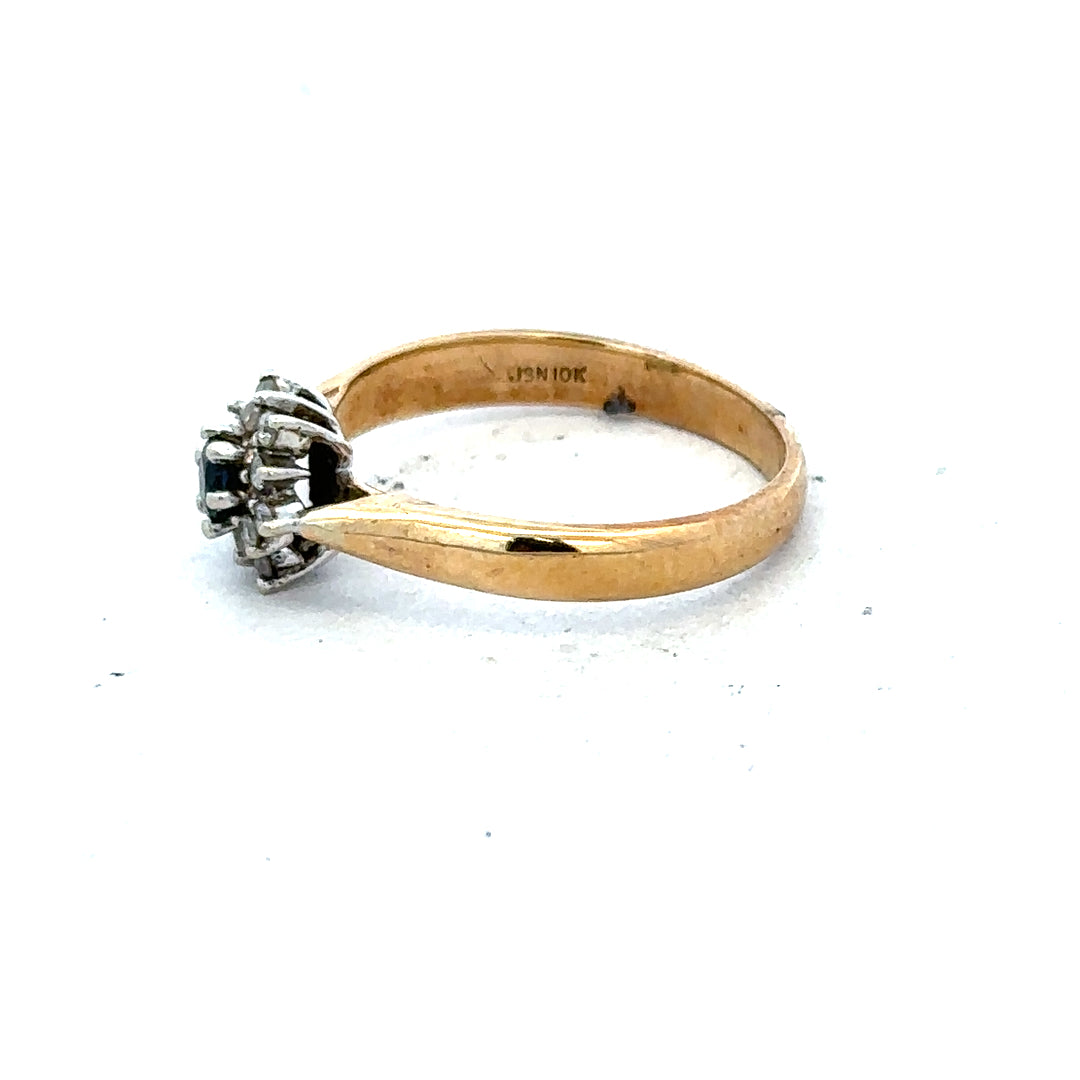 9ct gold diamond ring with a sparkling central diamond and elegant band, showcasing fine craftsmanship and timeless style.