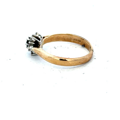 9ct gold diamond ring featuring a sparkling central diamond and elegant band, unbranded jewelry accessory.