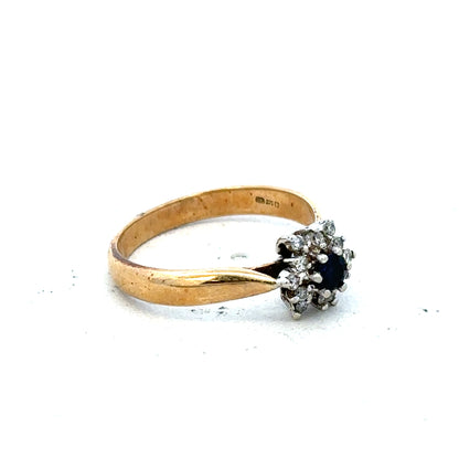 9ct gold diamond ring featuring a sparkling central diamond and a sleek band, showcasing elegant jewelry craftsmanship.
