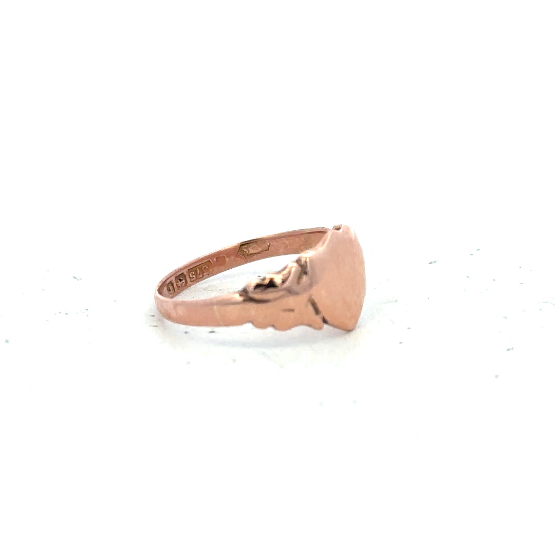9ct gold ring in size O with a simple band design, unbranded jewelry, shown from a side view.