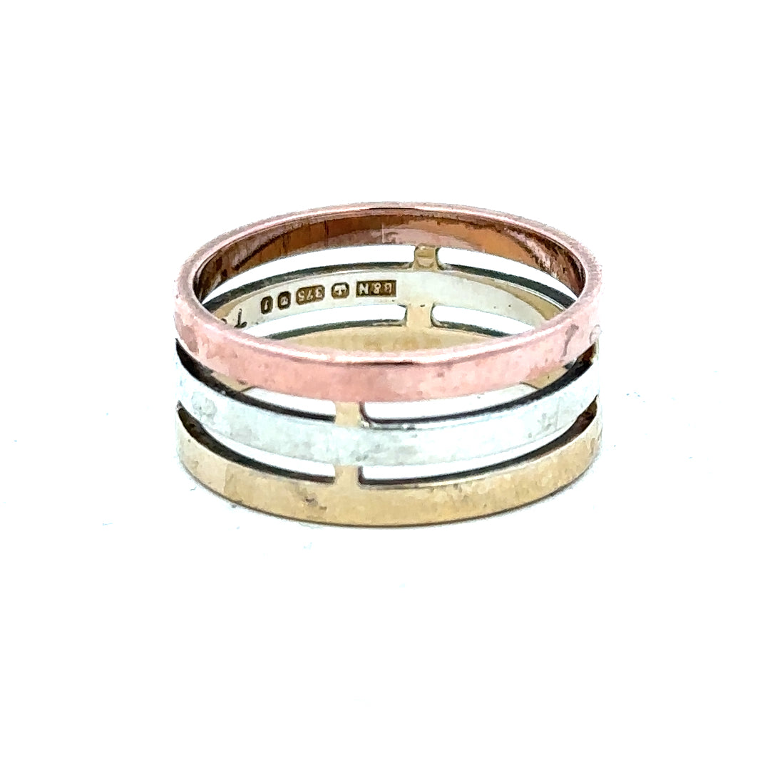 Gold ring in size P made of 9-carat gold, showcasing a simple band design against a neutral background.