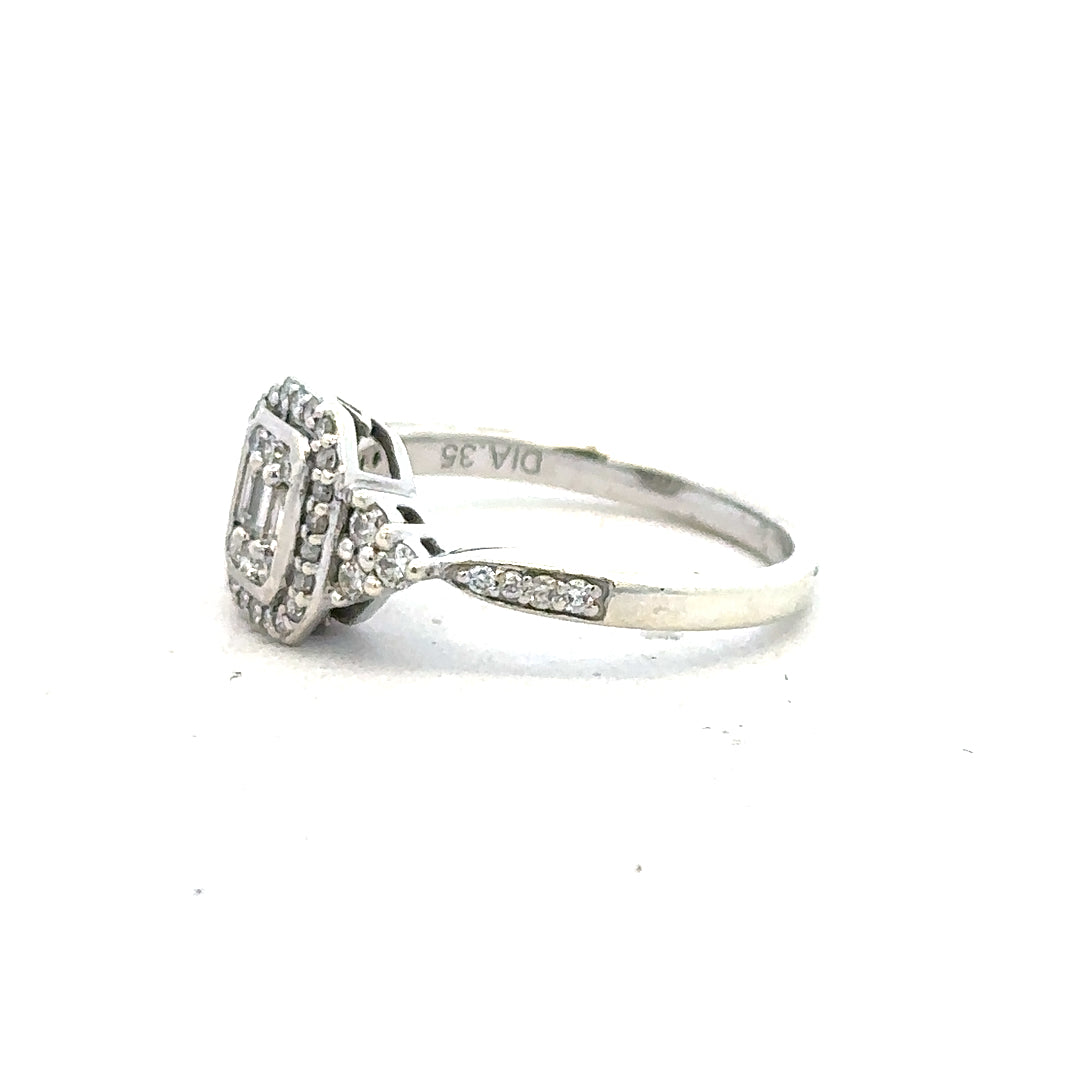 9ct white gold diamond ring with 0.35 carats, size J, featuring a sparkling central diamond on a sleek band.