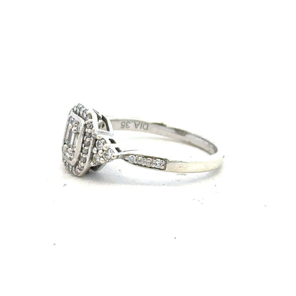 9ct white gold diamond ring with 0.35 carats, size J, featuring a sparkling central diamond on a sleek band.