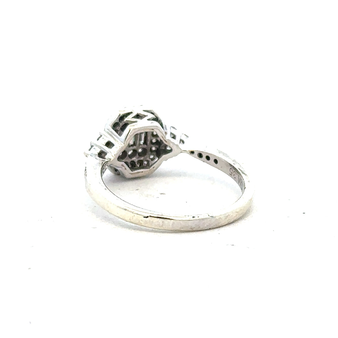 9ct white gold diamond ring with 0.35 carats, size J, featuring a sparkling central diamond and elegant band design.