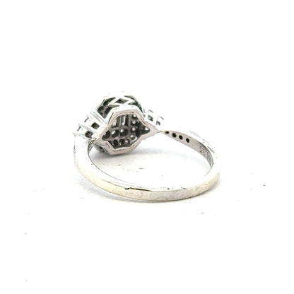 9ct white gold diamond ring with 0.35 carats, size J, featuring a sparkling central diamond and elegant band design.