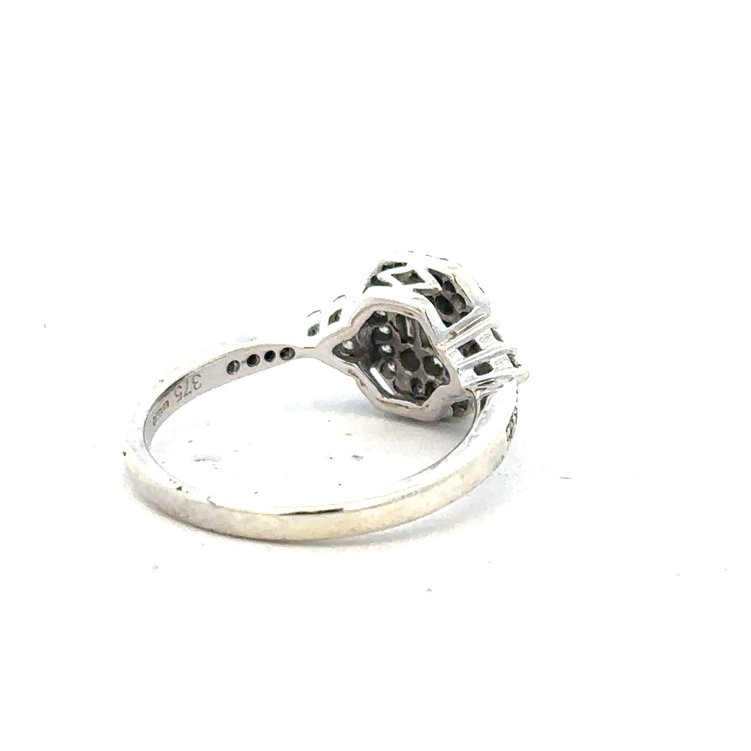 9ct white gold diamond ring with 0.35 carat center stone, size J, featuring a sleek and elegant design.