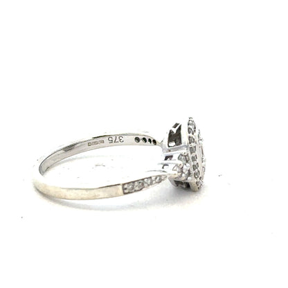 9ct white gold diamond ring with 0.35 carat center stone, size J, featuring a sleek and elegant design.