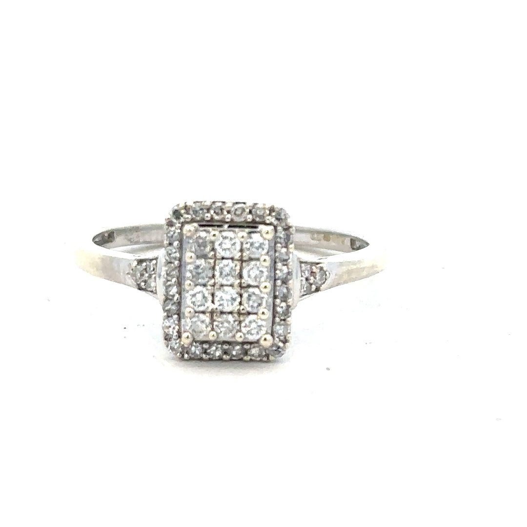 9ct white gold diamond ring with 0.36 carats, size S, featuring a sparkling central diamond and elegant band design.