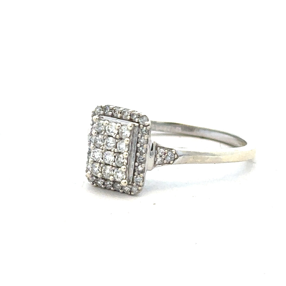 9ct white gold diamond ring with 0.36 carats, size S, featuring a sparkling central diamond and elegant design.