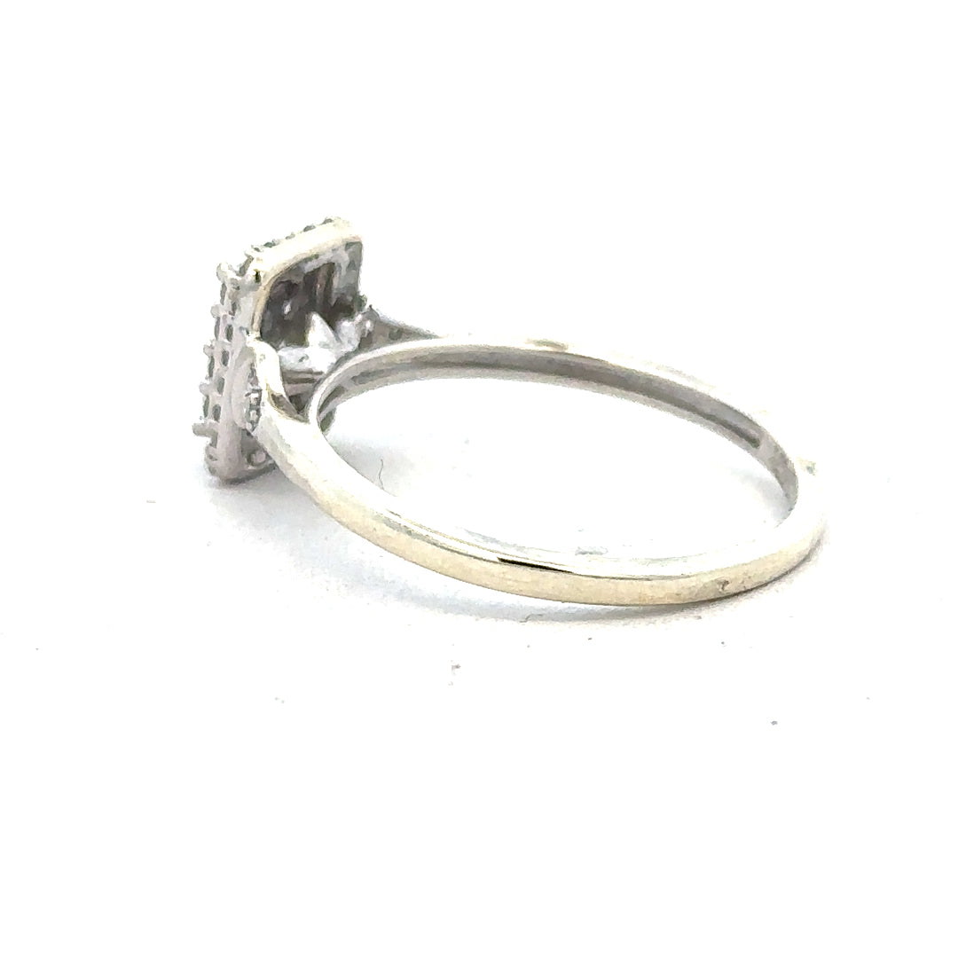 9ct white gold diamond ring with 0.36 carats, size S, featuring a sparkling central diamond and a sleek band design.