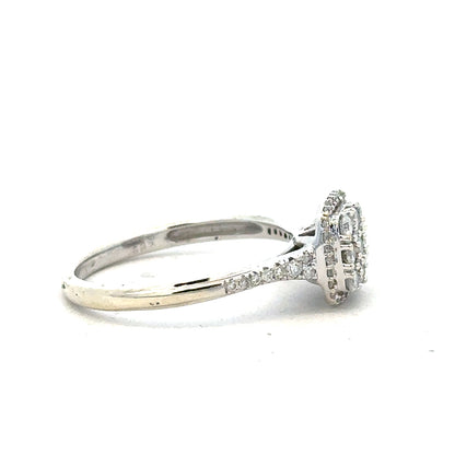 9ct white gold diamond ring with 0.40 carats, size P, featuring a sparkling central diamond and elegant band design.