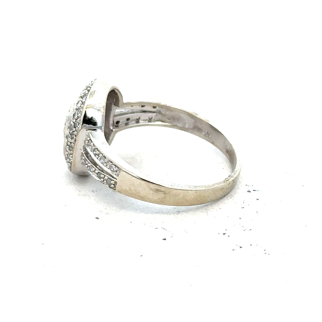 9ct white gold diamond ring with 1/2 carat solitaire, size P, featuring a sparkling diamond centerpiece.