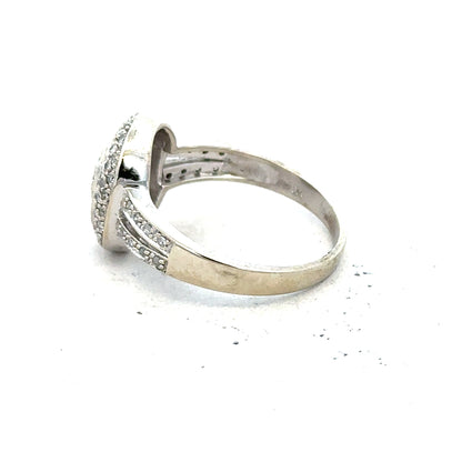 9ct white gold diamond ring with 1/2 carat solitaire, size P, featuring a sparkling diamond centerpiece.