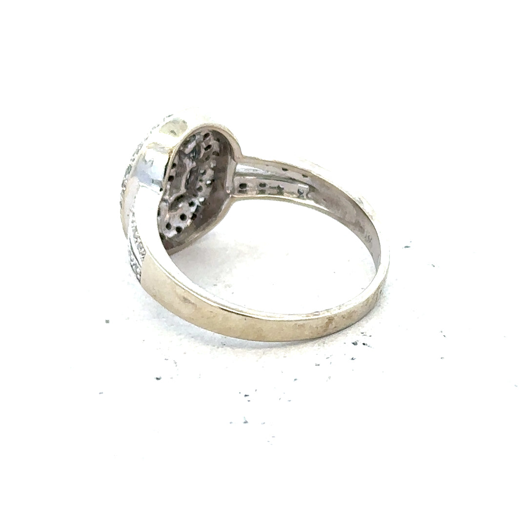 9ct white gold diamond ring with 1/2 carat center stone, size P, featuring a sleek band and sparkling solitaire design.