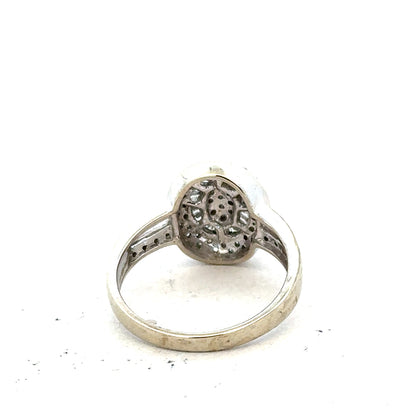 9ct white gold diamond ring with 1/2 carat center stone in size P, featuring a sleek band and sparkling diamonds.