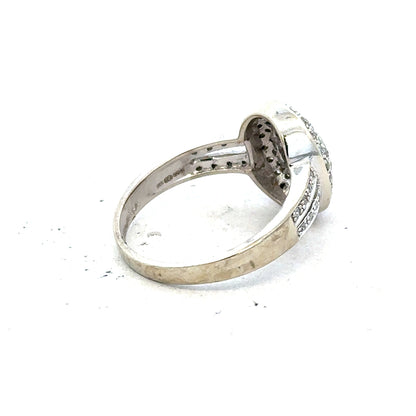 9ct white gold diamond ring with half-caret round diamond, size P, showcasing a sleek and elegant design.