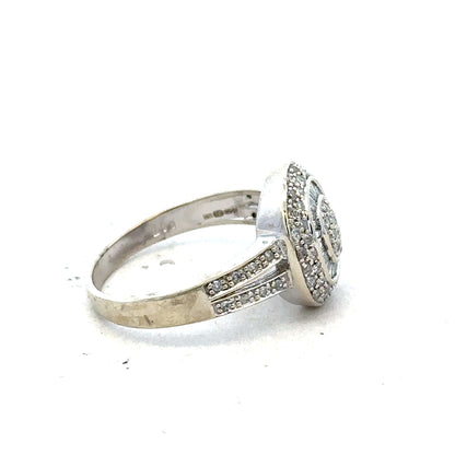 9ct white gold diamond ring with 1/2 carat center stone, size P, featuring a sleek band and sparkling diamond accents.