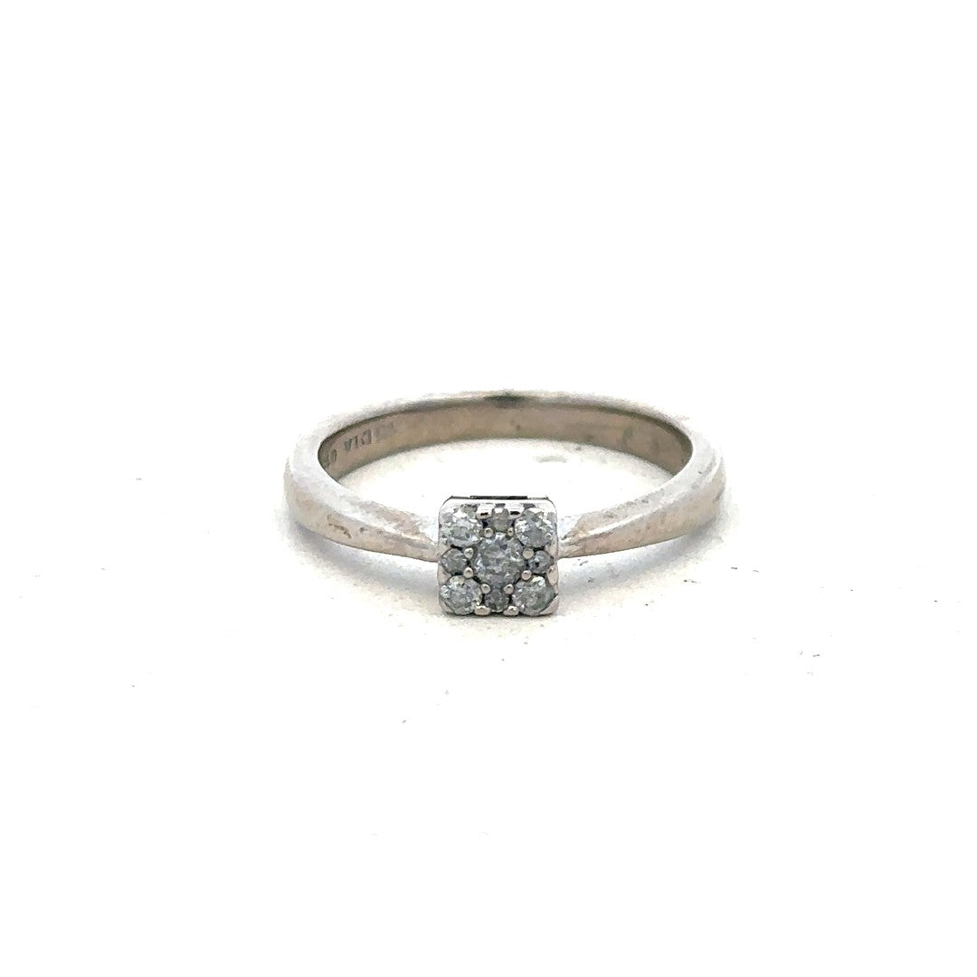 9ct white gold diamond ring with 15pts of diamonds, size K1/2, featuring a sleek, elegant design.