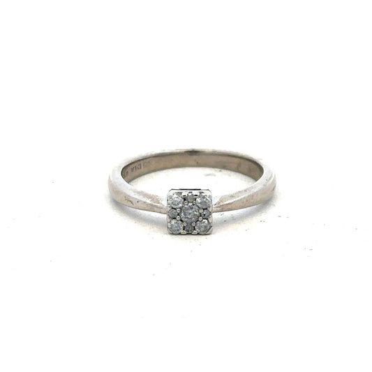 9ct white gold diamond ring with 15pts of diamonds, size K1/2, featuring a sleek, elegant design.