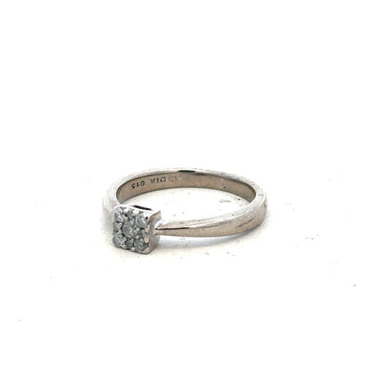 9ct white gold diamond ring with 15pts diamonds in size K1/2, featuring a sleek design and a polished finish.