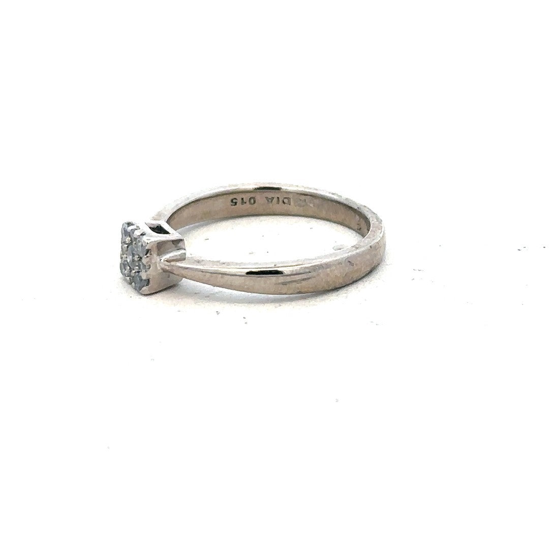 9ct white gold diamond ring with 15pts diamonds in size K1/2, featuring a sleek, elegant design and unbranded craftsmanship.