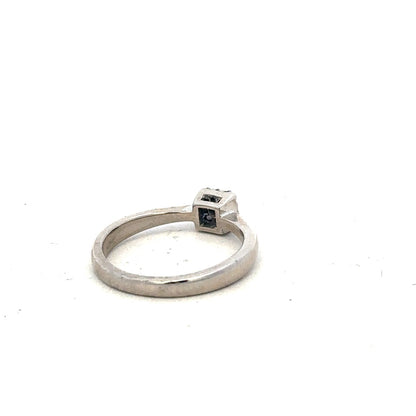 9ct white gold diamond ring with 15pts of diamonds in size K 1/2, featuring a sleek and elegant design.