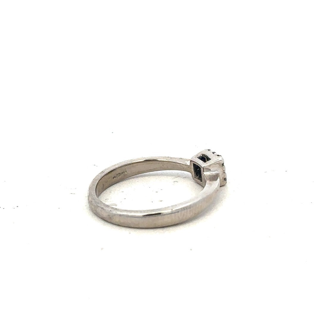 9ct white gold diamond ring with 15pts of diamonds, size K1/2, featuring a sleek and elegant design.