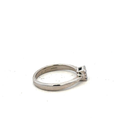 9ct white gold diamond ring with 15pts of diamonds in size K1/2, showcasing a sleek and elegant design.