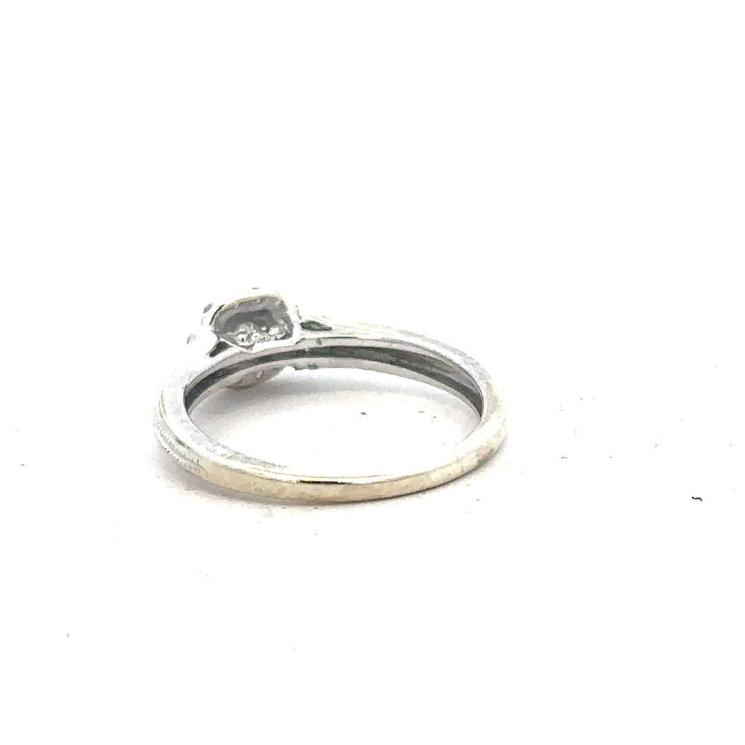 9ct white gold diamond ring with 20pts sparkling center diamond, size K1/2, unbranded jewelry showcasing elegant craftsmanship.