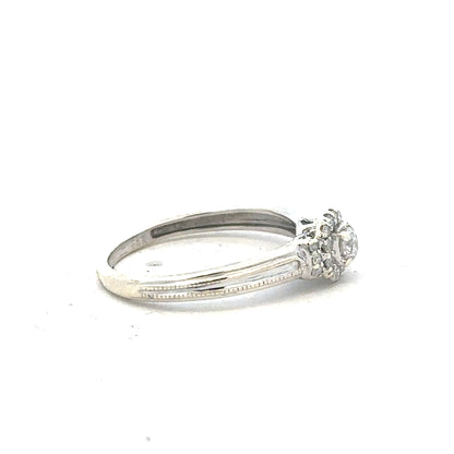 9ct white gold diamond ring with 20pts sparkling diamonds in size K1/2, featuring a sleek, elegant design.