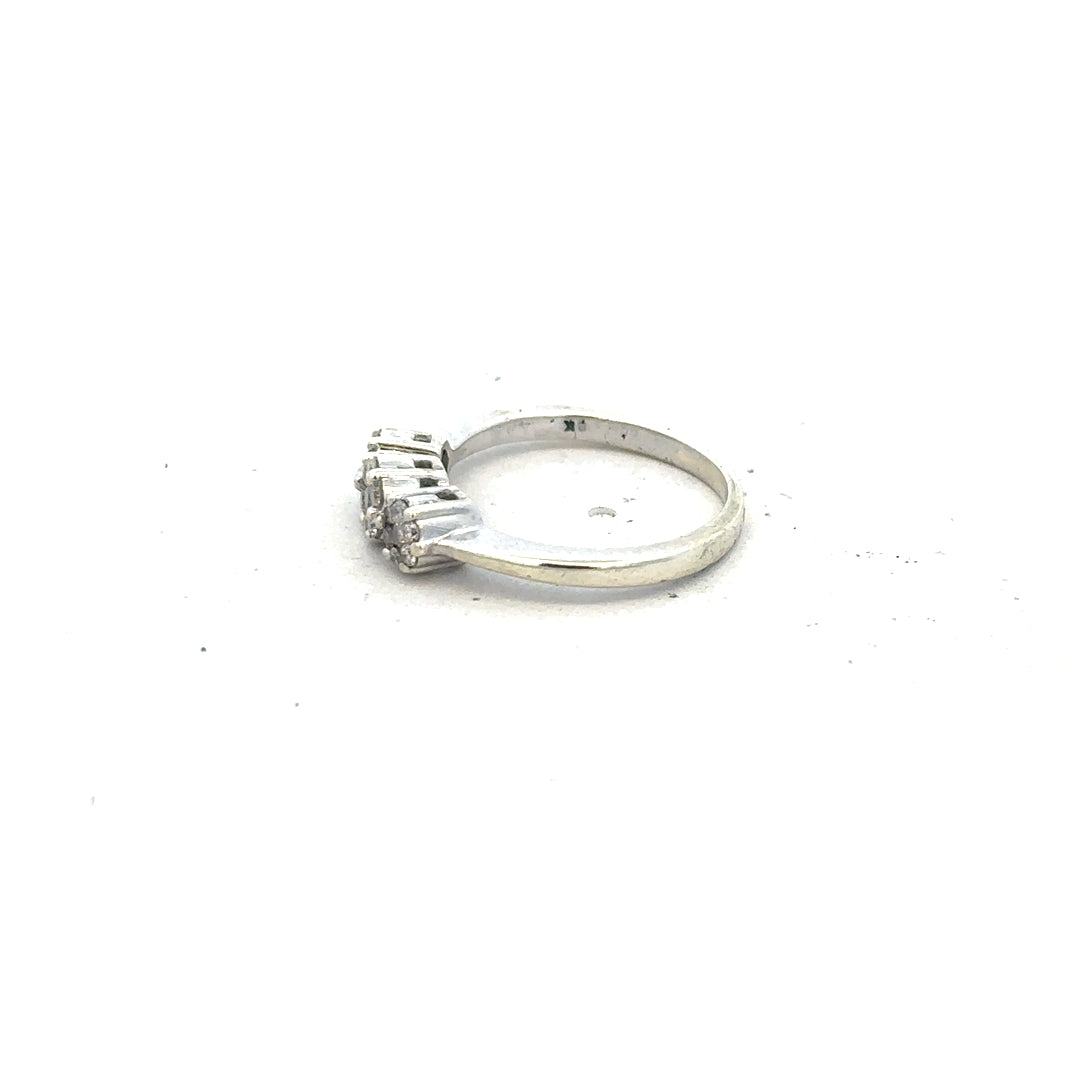 9ct white gold diamond ring with 25pts of diamonds in size I1/2, showcasing the elegant jewelry design.