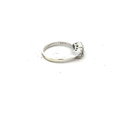 9ct white gold diamond ring with 25pts of diamonds, size I1/2, showcasing elegant jewelry design.