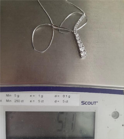 9ct white gold chain, 17 inch length, 5.1g, unbranded jewelry, close-up view of the elegant gold chain.