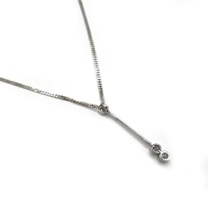 9ct white gold chain with 18ct white gold diamond pendant, elegant jewelry piece, showcasing sparkling diamonds and fine craftsmanship.