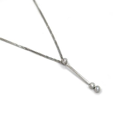 9ct white gold chain with 18ct white gold diamond pendant, elegant jewelry piece featuring sparkling diamonds and a delicate design.
