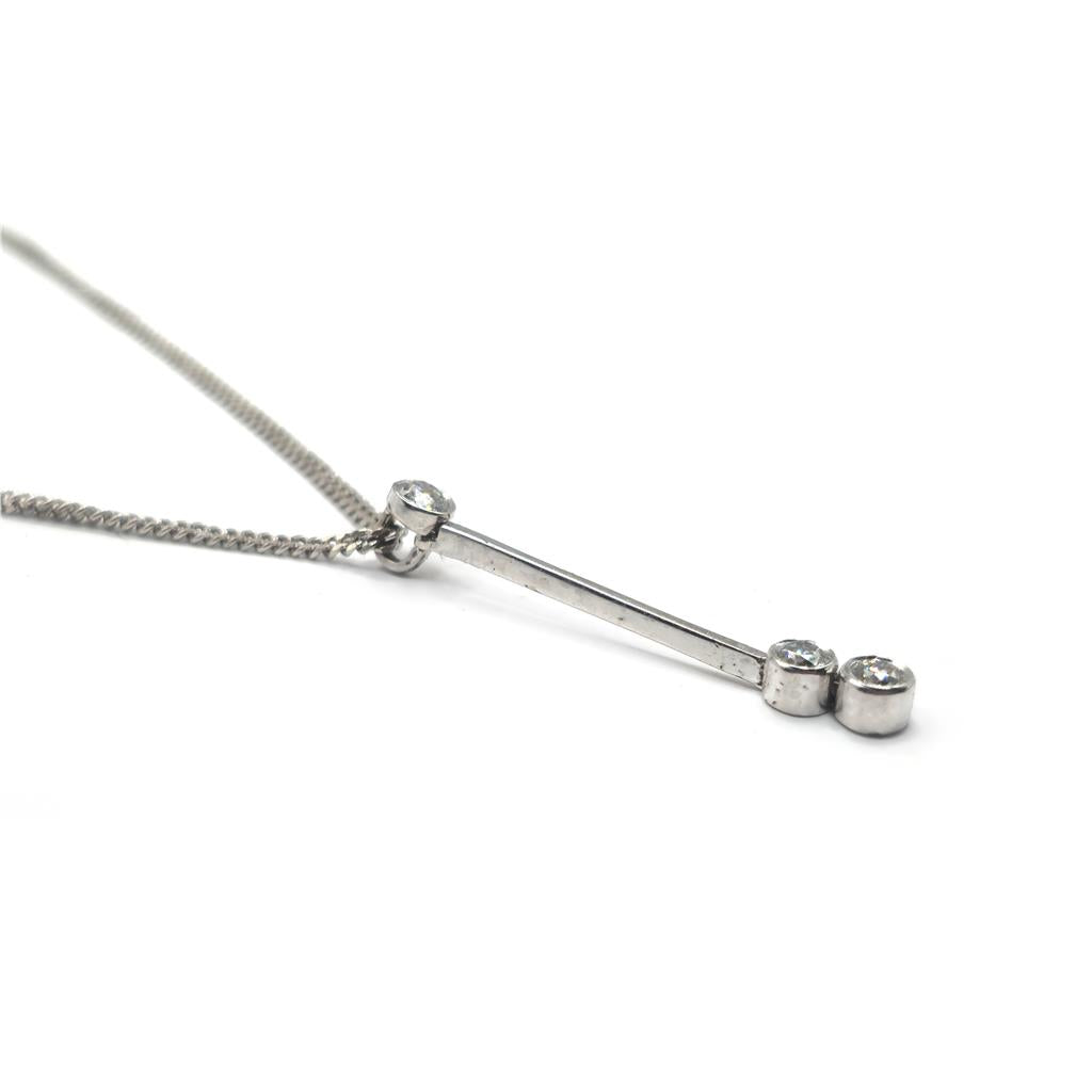 9ct white gold chain with 18ct white gold diamond pendant, featuring sparkling diamonds on a sleek jewelry piece.