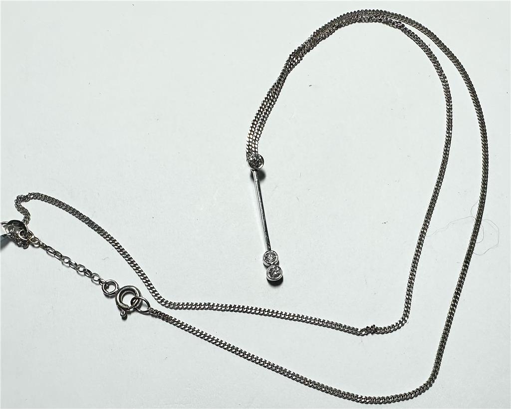 9ct white gold chain with an 18ct white gold diamond pendant, weight 3.5g, elegant jewelry piece with sparkling diamonds.