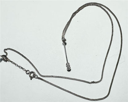 9ct white gold chain with an 18ct white gold diamond pendant, weight 3.5g, elegant jewelry piece with sparkling diamonds.