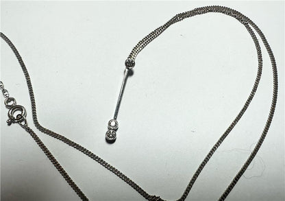 9ct white gold chain with 18ct white gold diamond pendant, featuring sparkling diamonds, weight 3.5g, unbranded jewelry accessory.