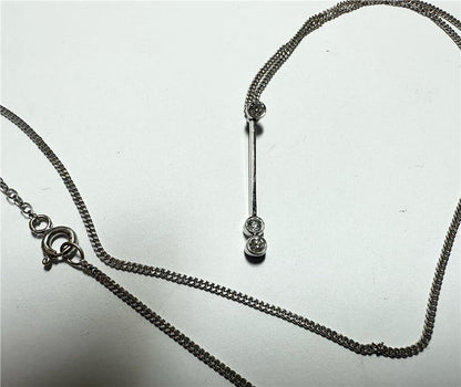 9ct white gold chain with 18ct white gold diamond pendant, 3.5g, elegant jewelry piece with sparkling diamonds.