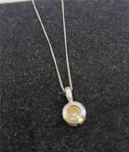 9ct white gold chain with pendant, unbranded jewelry, showcasing a sleek and elegant design in a close-up image.