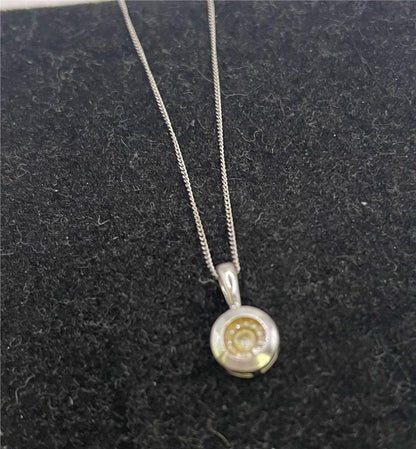 9ct white gold chain with pendant, unbranded jewelry piece featuring a sleek design and polished finish, shown on a white background.
