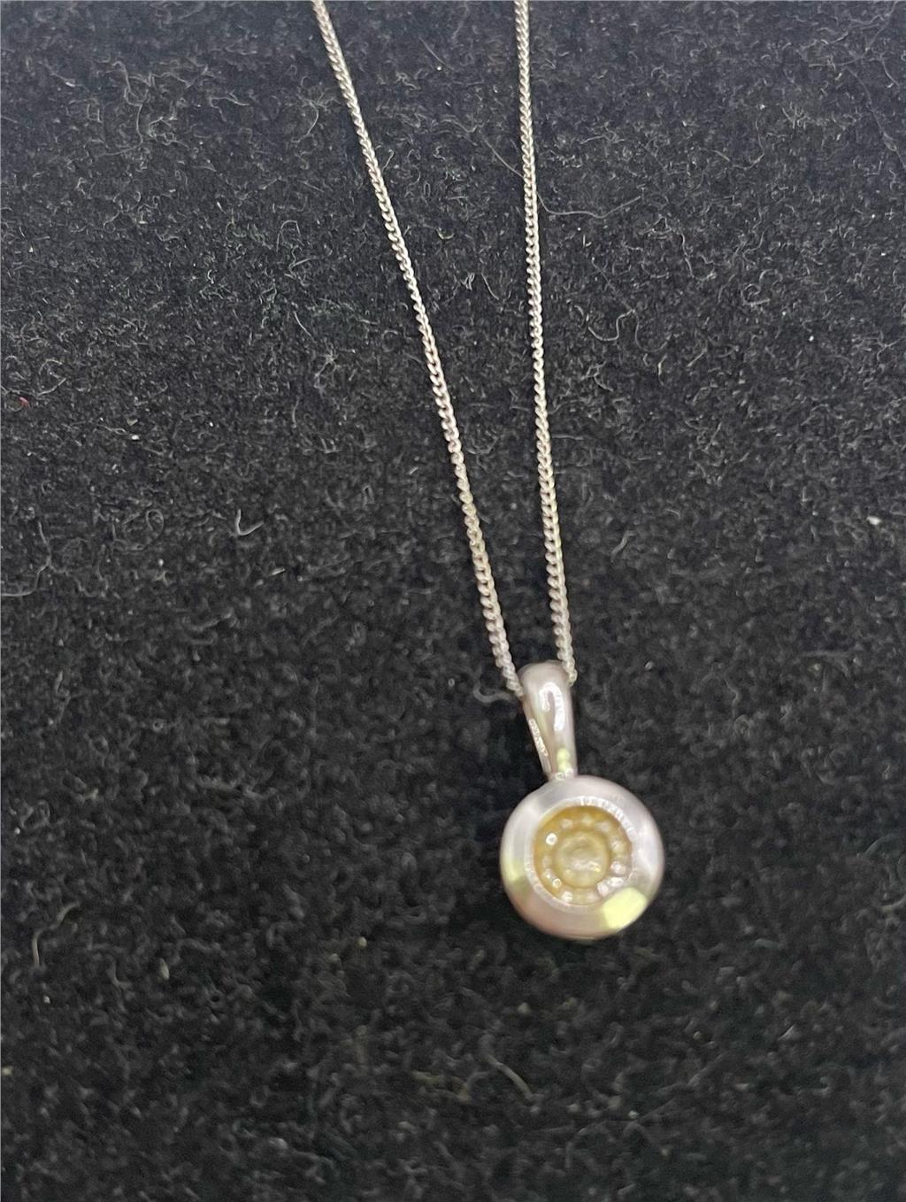 9ct white gold chain with a pendant, unbranded jewelry piece featuring a sleek and elegant design.