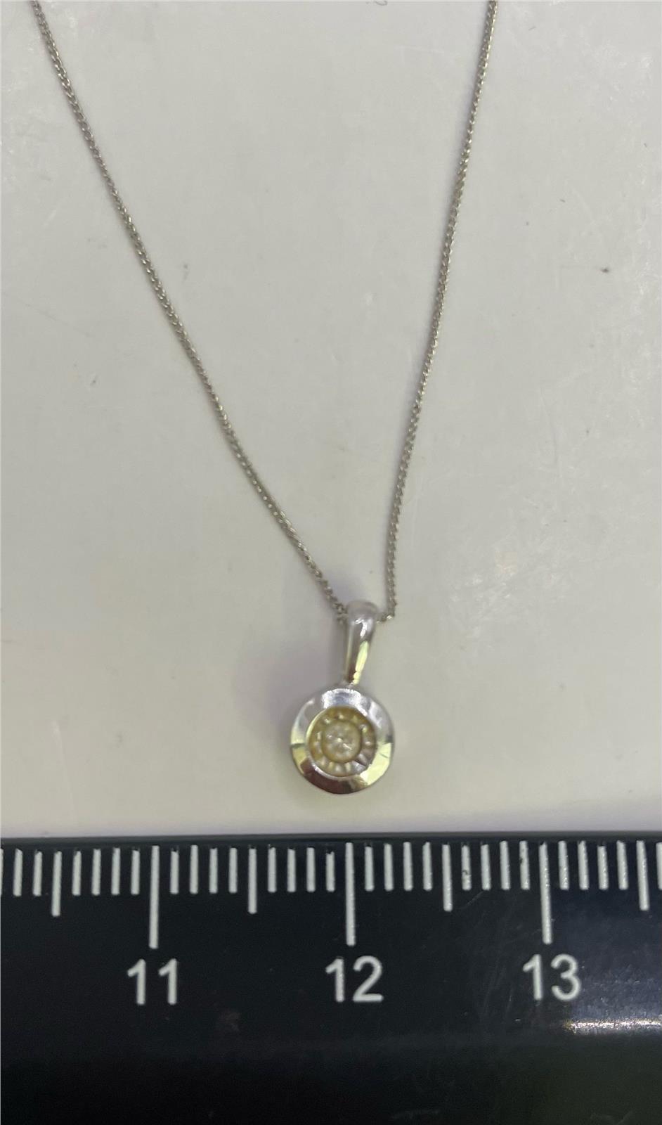 9ct white gold chain with pendant, showcasing a simple elegant design, unbranded jewelry accessory.