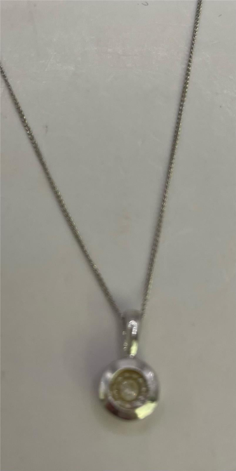 9ct white gold chain with pendant, unbranded jewelry, showcasing a simple and elegant design in the image.