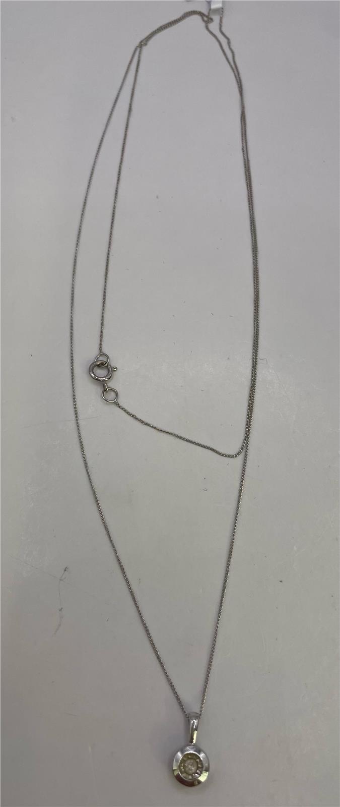 9ct white gold chain with a matching pendant, featuring a sleek and elegant design, unbranded jewelry accessory.
