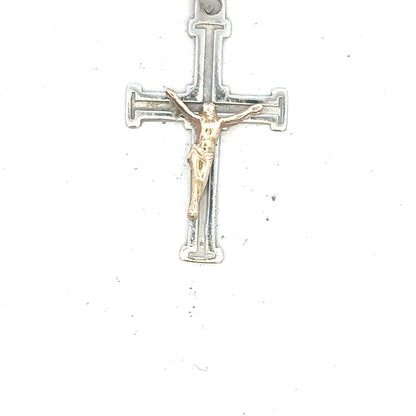 9ct white gold cross pendant weighing 1.7g, featuring a classic design, displayed against a neutral background.