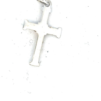 9ct white gold cross pendant weighing 1.7g, elegant jewelry piece with detailed design, unbranded.