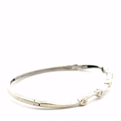 9ct white gold diamond bracelet featuring sparkling diamonds, weighing 7.7g, designed as a luxurious and elegant jewelry piece.