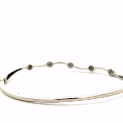 9ct white gold diamond bangle bracelet with sparkling diamonds, unbranded, weighing 7.7 grams, elegant jewelry accessory.